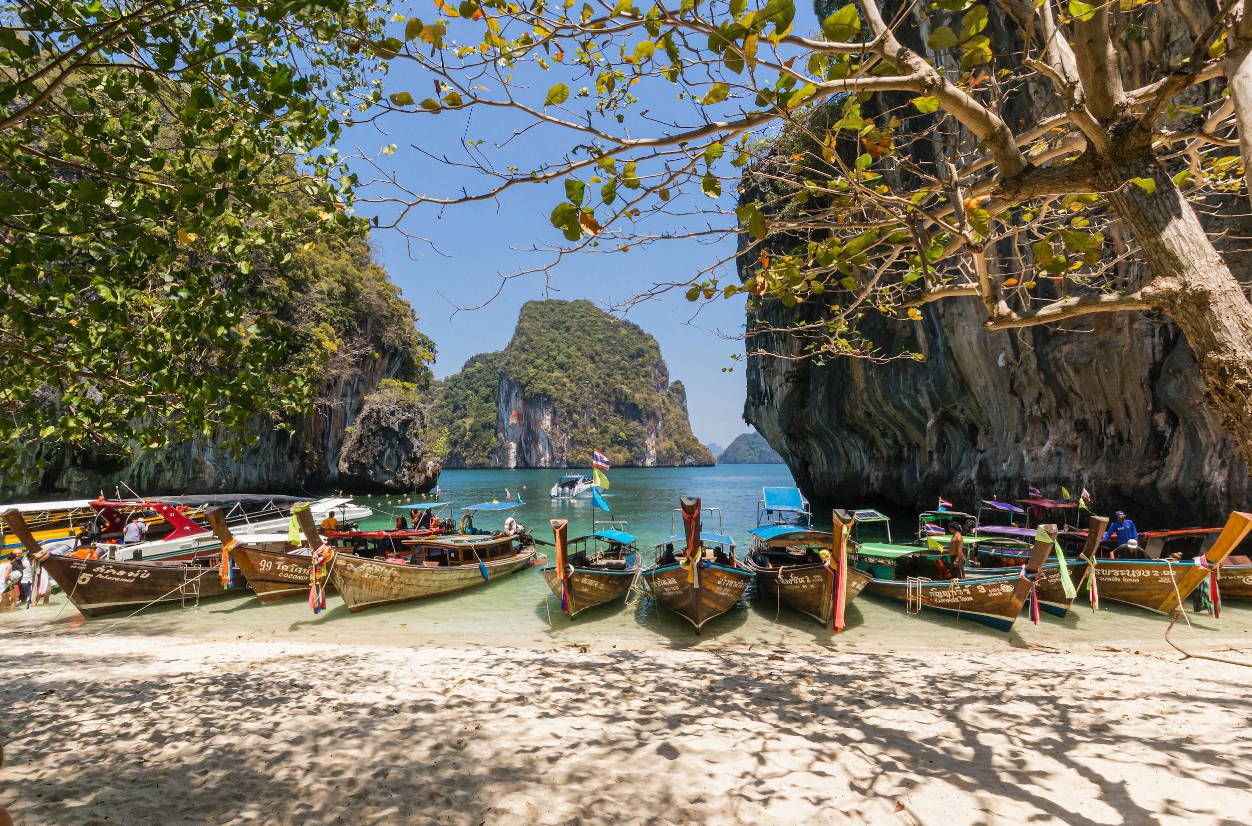 Image of boats on a beach in Thailand